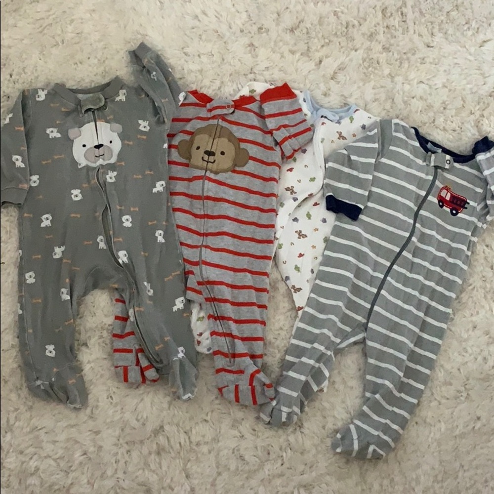 Four 3-6 month footed onesies